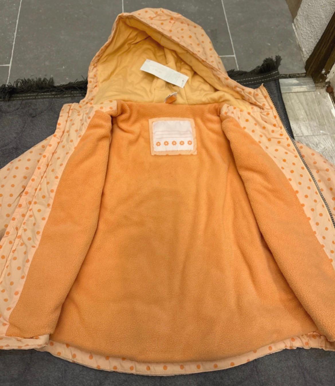 V03- Regenjacke Gr. 122